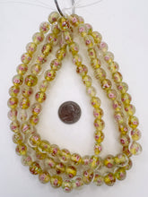 clear yellow green pink white, floral inside lined motif, semi dull finish, vintage stock glass, 12mm round mix, 15" strand, SOLD PER STRAND