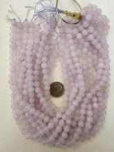color enhanced quartz: pale lavender purple, 8mm round, 15" strand, sold per strand