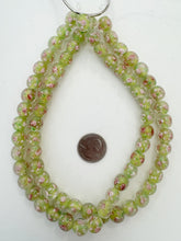 clear green pink white, floral inside lined motif, semi dull finish, vintage stock glass, 11mm round mix, 15" strand, SOLD PER STRAND
