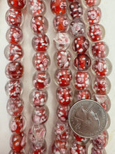 clear red pink white, floral inside lined motif, semi dull finish, vintage stock glass, 11-13mm round mix, 15" strand, SOLD PER STRAND