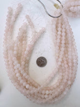 color enhanced quartz: pale pink, 8mm round, 15" strand, sold per strand