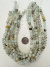 color enhanced quartz: pale mint green, 8mm round, 15" strand, sold per strand