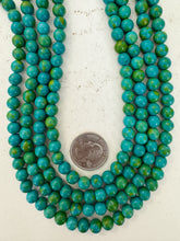 color enhanced magnesite: dark turquoise blue green, 8mm round, 15" strand, sold per strand
