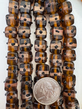 root beer brown black copper, dotted stripe motif, vintage stock glass, 12mm cube, 15" strand, SOLD PER STRAND