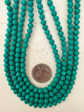 color enhanced magnesite: dark turquoise blue, 6mm round, 15" strand, sold per strand