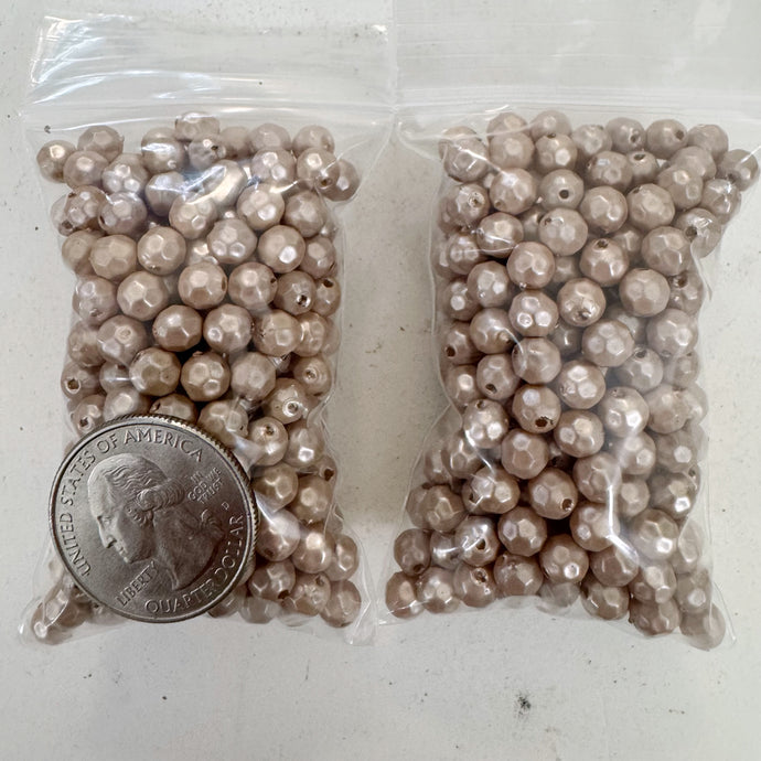 coated dark pearly peach, singe color, vintage look acrylic, 6mm faceted round,  sold per approximately 27 gram bag