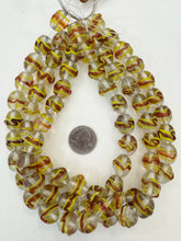 clear red orange yellow, swirl motif, vintage stock glass, 16x14mm barrel, 15" strand, SOLD PER STRAND