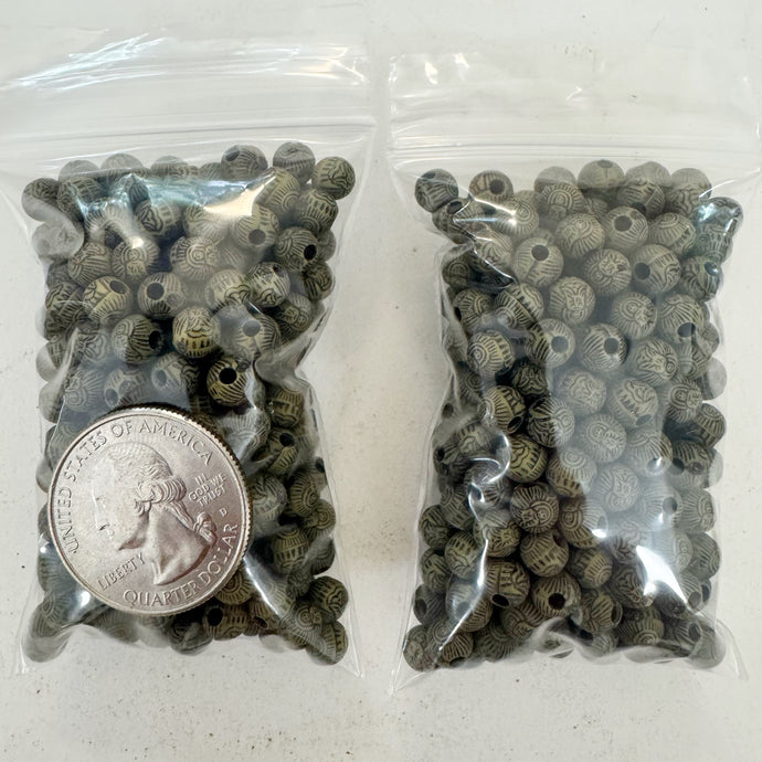 matte dark pale green swirl, vintage look acrylic, 6mm carved design buddha motif round,  sold per approximately 27 gram bag