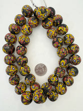 matte yellow red white blue black millefiori motif, vintage stock glass, 19-20mm round mix, 15" strand, SOLD PER STRAND