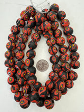 matte red yellow white black millefiori motif, vintage look glass, 17-18mm round mix, 15" strand, SOLD PER STRAND