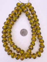 yellow green copper red, dotted swirl motif, vintage stock glass, 15mm round, 15" strand, SOLD PER STRAND