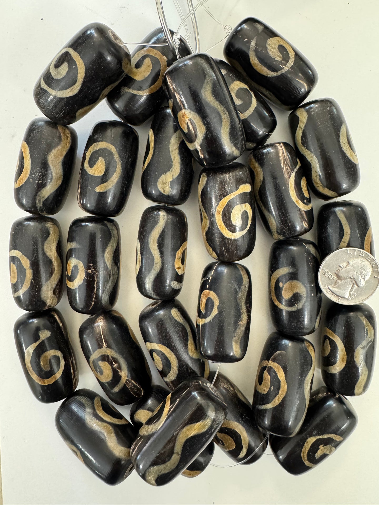 black off white golden horn, spiral squiggle line motif, 42x23mm tube, 15