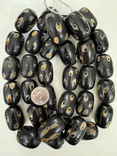 black off white golden horn, evil eye motif, 32x24mm barrel tube, 15" strand, sold per strand