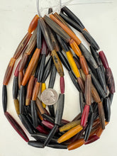 black off white golden red horn, mixed motif, 17-60mm tube mix, 15" strand, sold per strand