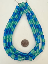 blue green, two tone motif, vintage stock glass, 22x9mm dent tube, 15" strand, SOLD PER STRAND
