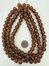 root beer brown copper, swirl motif, vintage stock glass, 13mm round, 15" strand, SOLD PER STRAND