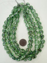 saturated dark pale green multi silver, inside lined motif, vintage stock glass, 15x15x8mm heart, 15" strand, SOLD PER STRAND