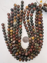 red creek jasper, 10mm round, 15" strand, sold per strand