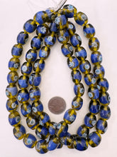 dark green yellow blue white, dotted swirl motif, vintage stock glass, 17x14mm barrel, 15" strand, SOLD PER STRAND