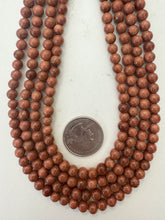 goldstone, 6mm round, 15" strand, sold per strand
