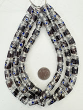 clear dark purple white blue, dotted swirl motif, vintage stock glass, 18x12mm tube, 15" strand, SOLD PER STRAND