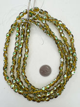 amber yellow metallic silver green orange, dotted motif, vintage stock glass, 9x7mm bowed tube barrel mix, 15" strand, SOLD PER STRAND