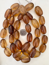 dark peach tones mix, vintage look resin, 31-33mm window cut bowed tube mix, 15" strand, sold per strand