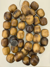 brown pale peach off white, faux bone, vintage look resin, 29x26mm barrel, 15" strand, sold per strand