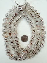 clear dark maroon red metallic silver, inside lined swirl motif, vintage stock glass, 15x15x8mm coin mix, 15" strand, SOLD PER STRAND