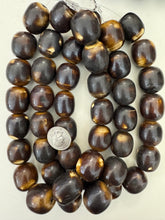 brown off white, faux bone, vintage look resin, 26x23mm barrel, 15" strand, sold per strand