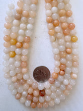 peach aventurine, 8mm round, 15" strand, sold per strand