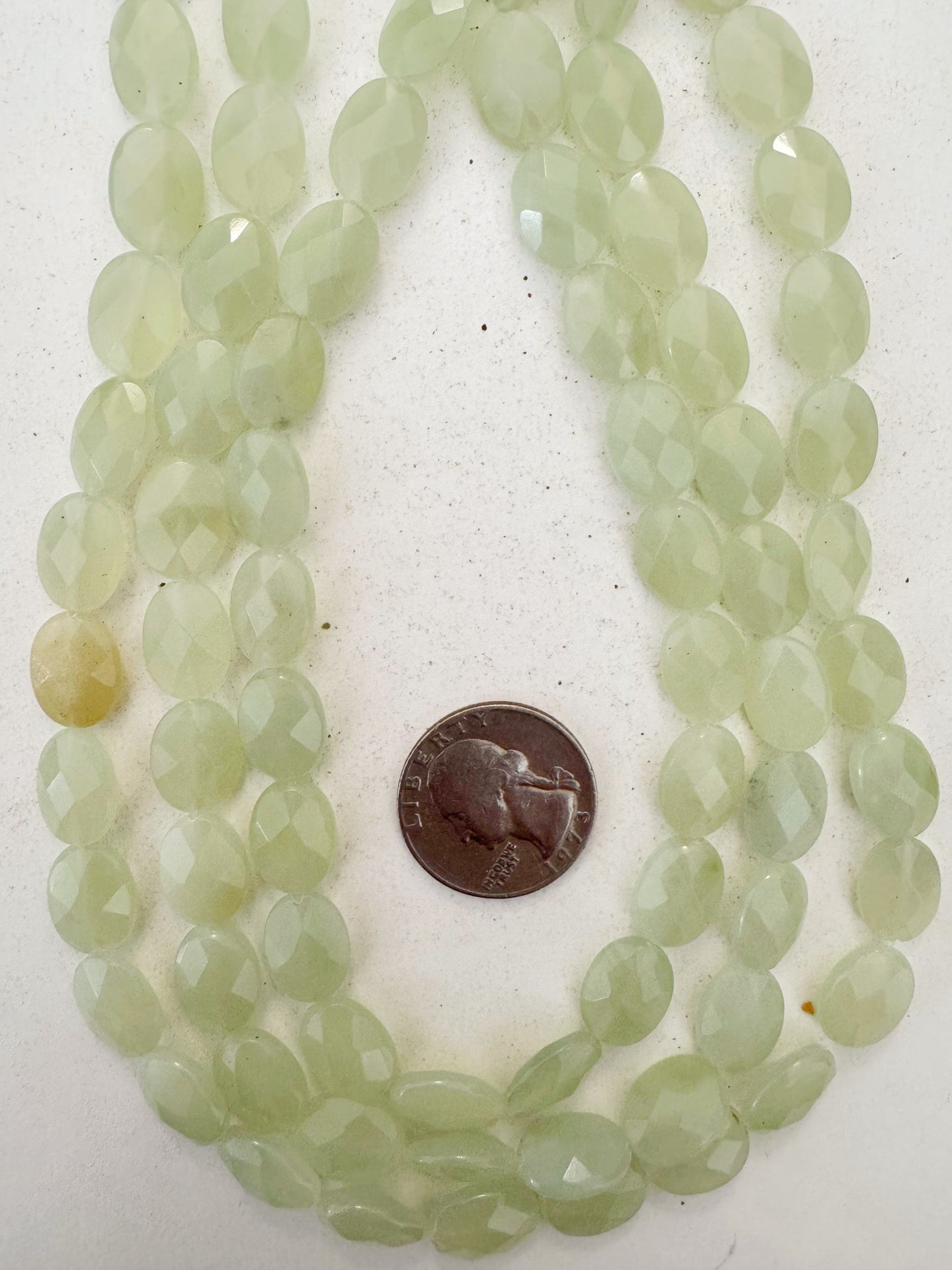 new jade, 14x10x5mm faceted oval, 15