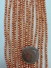 copper plated hematite, 3mm faceted round, 15" strand,  SOLD PER STRAND