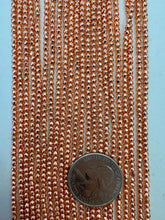 copper plated hematite, 2.5mm faceted round, 15" strand,  SOLD PER STRAND
