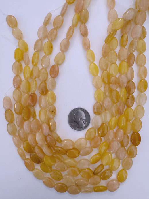 yellow jade, 14x9x5mm oval, 15