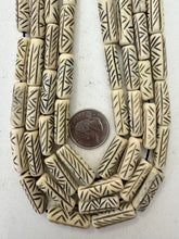 off white brown, carved crossing lines motif, vintage stock bone, 24x8mm tube, 15" strand, SOLD PER STRAND
