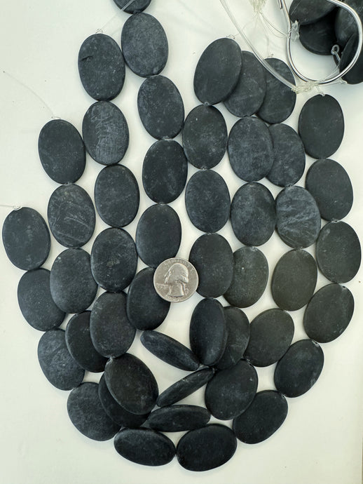 matte black stone, 35x25x5mm oval, 15