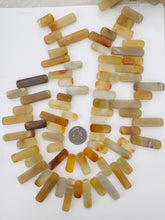 carnelian, 21-40mm stick pendant mix, 15" strand, sold per strand