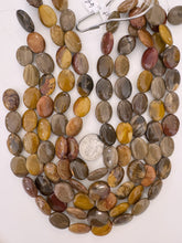 red wooden jasper, 20x16x6mm oval, 15" strand, sold per strand