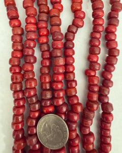 Deep red glass, 9x7mm pony rondelle, 24" strand