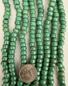Pearly seafoam green pony glass, 9x7mm rondelle, 24" strand