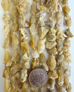 Golden rutilated quartz, 12-18mm mixed size rough nuggets, 15" strand (mixed tone hank)
