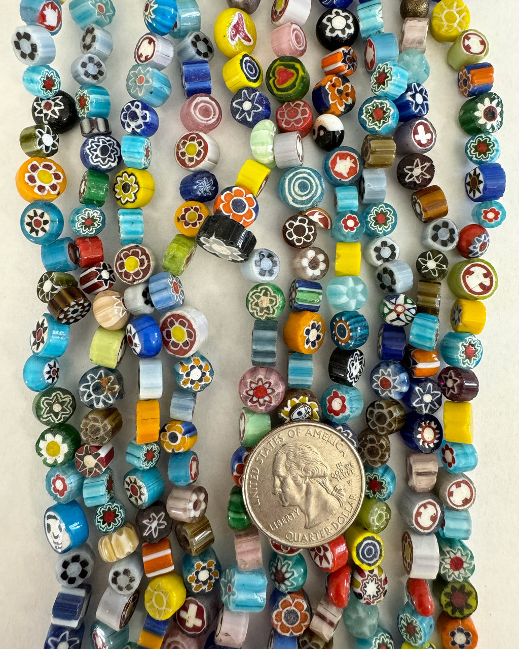 Mixed color millefiori glass, 6-11mm coin mix, off center drilled 15